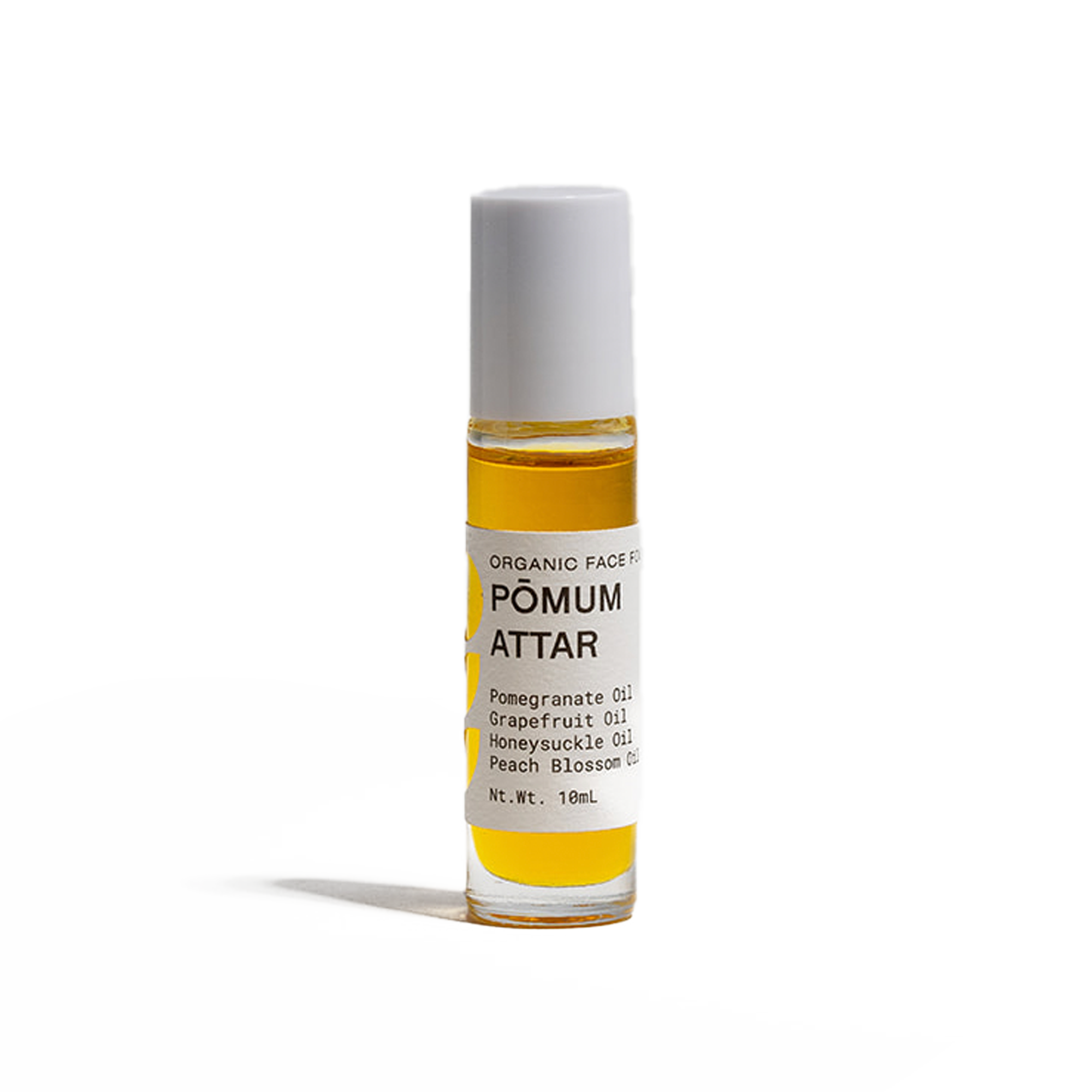 Title: "Pomum Attar - Natural Botanical Fragrance Description" Description: This file provides information about Pomum Attar, a botanical fragrance made from all-natural ingredients. It is alcohol and chemical-free, non-greasy, and has a long-lasting refreshing scent. The oil also moisturizes the skin, making it suitable for all skin types.