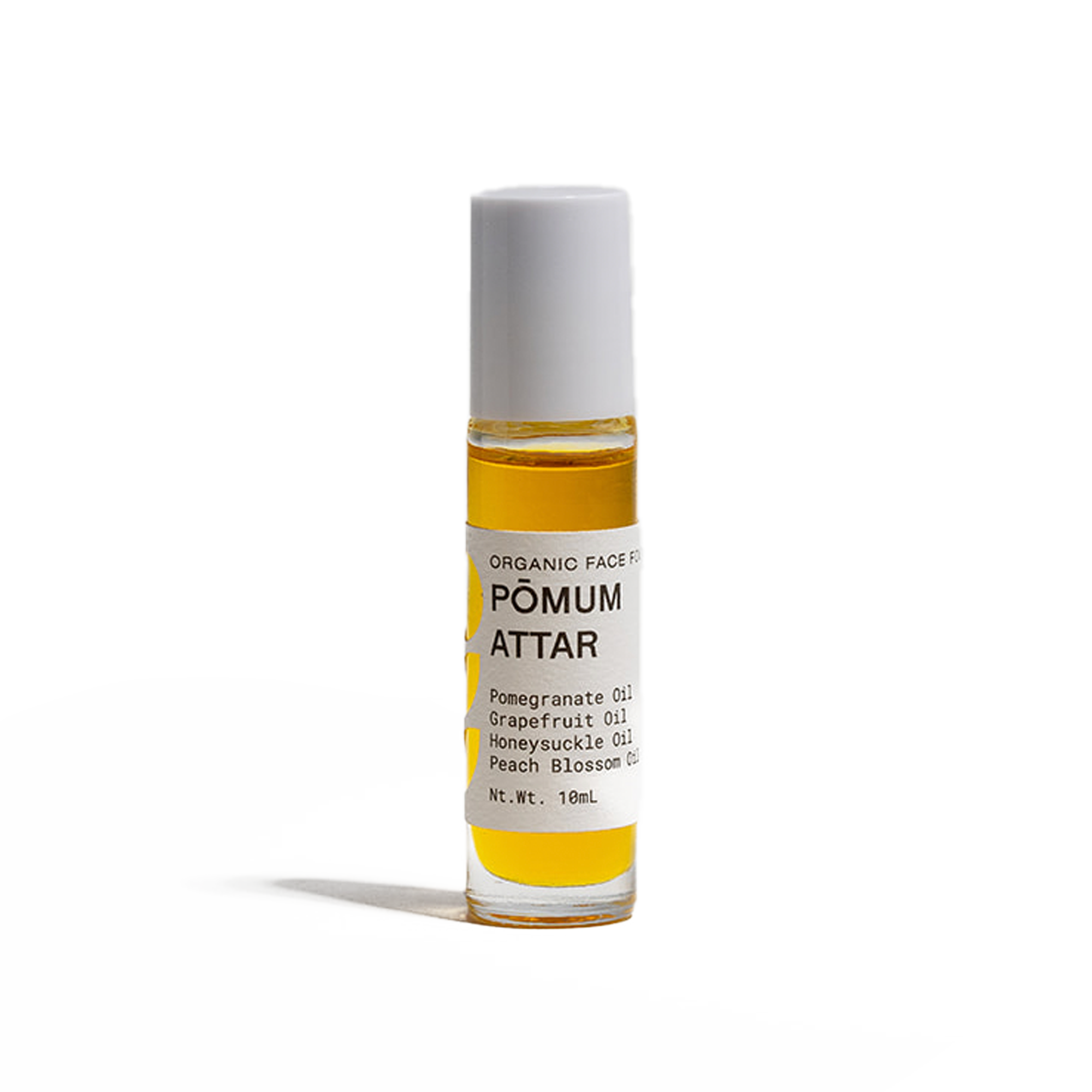 Title: "Pomum Attar - Natural Botanical Fragrance Description"  Description: This file provides information about Pomum Attar, a botanical fragrance made from all-natural ingredients. It is alcohol and chemical-free, non-greasy, and has a long-lasting refreshing scent. The oil also moisturizes the skin, making it suitable for all skin types.
